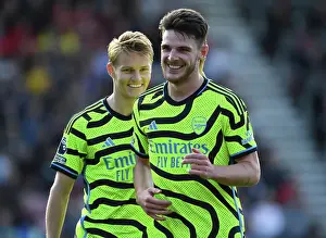Arsenal's Martin Odegaard and Declan Rice Face Off Against AFC Bournemouth in Premier League Clash (2023-24)