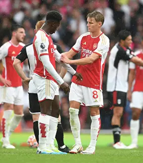 Arsenal's Martin Odegaard and Eddie Nketiah Share a Moment during Arsenal vs. Fulham (2023-24)