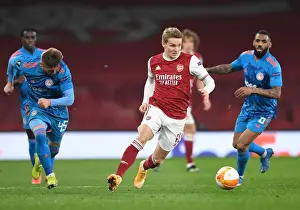 Arsenal's Martin Odegaard in Europa League Action vs Olympiacos (Behind Closed Doors)