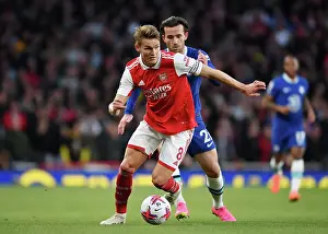 Arsenal's Martin Odegaard Faces Off Against Chelsea's Ben Chilwell in Intense Premier League Clash