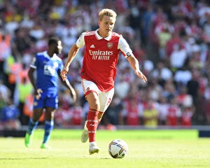 Arsenal v Leicester City 2022-23 Collection: Arsenal's Martin Odegaard Faces Off Against Leicester City in 2022-23 Premier League Clash
