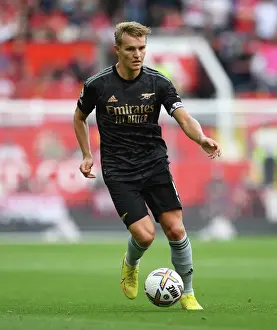 Arsenal's Martin Odegaard Faces Off Against Manchester United in Intense 2022-23 Premier League Showdown