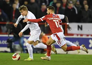 Nottingham Forest V Arsenal FA Cup 3rd And 2021-22 Prints: Arsenal's Martin Odegaard Faces Off Against Nottingham Forest's Philip Zinckernagel in FA Cup Third Round