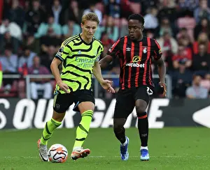 AFC Bournemouth V Arsenal 2023-24 Prints: Arsenal's Martin Odegaard Faces Pressure from Bournemouth's Luis Sinisterra in Premier League Clash
