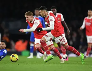 Arsenal's Martin Odegaard and Gabriel Martinelli in Action: A Premier League Battle at Emirates Stadium, 2022-23