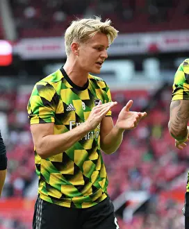 Arsenal's Martin Odegaard Gears Up for Manchester United Clash in Premier League (2022-23)
