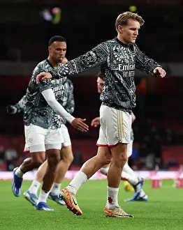 Arsenal V West Ham United 2023-24 Prints: Arsenal's Martin Odegaard Gears Up: Arsenal FC vs West Ham United