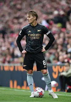 Arsenal's Martin Odegaard Goes Head-to-Head with Liverpool in Premier League Battle (2022-23)