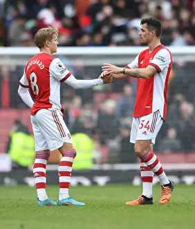 Arsenal's Martin Odegaard and Granit Xhaka Celebrate Victory Over Brighton & Hove Albion in Premier League