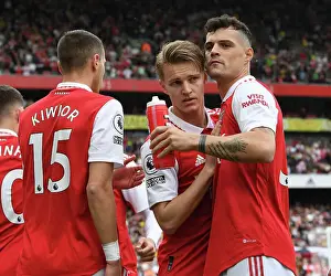 Arsenal V Brighton And Hove Albion 2022-23 Prints: Arsenal's Martin Odegaard and Granit Xhaka Pre-Match Huddle vs Brighton & Hove Albion