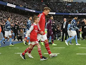 Arsenal's Martin Odegaard and Mascot Before Manchester City Clash - Premier League 2022-23