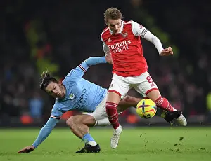 Arsenal's Martin Odegaard Outsmarts Jack Grealish: Intense Battle in Arsenal vs. Manchester City