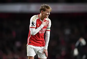 Arsenal V West Ham United 2023-24 Prints: Arsenal's Martin Odegaard in Pain: Arsenal FC vs West Ham United