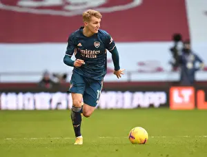 Aston Villa V Arsenal 2020-21 Prints: Arsenal's Martin Odegaard Plays in Empty Villa Park: Premier League 2021 (Aston Villa vs Arsenal)