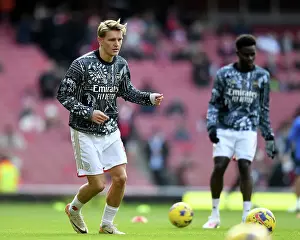Arsenal V Brighton And Hove Albion 2023-24 Prints: Arsenal's Martin Odegaard Prepares: Arsenal vs Brighton & Hove Albion (2023-24)