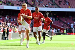 Arsenal V Manchester United 2023-24 Prints: Arsenal's Martin Odegaard Prepares for Battle: Arsenal vs Manchester United