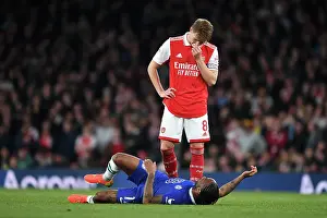 Arsenal V Chelsea 2022-23 Prints: Arsenal's Martin Odegaard and Raheem Sterling Lock Eyes During Intense Arsenal v Chelsea Clash (2022-23)