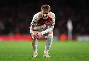 Arsenal V West Ham United 2023-24 Prints: Arsenal's Martin Odegaard Reacts to Injury During Arsenal v West Ham United (2023-24)