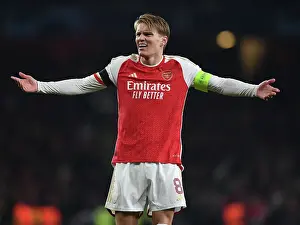 Arsenal V RC Lens 2023-24 Prints: Arsenal's Martin Odegaard Shines in Champions League Clash Against RC Lens