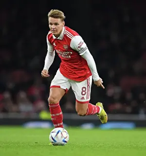 Arsenal V Juventus 2022-23 Prints: Arsenal's Martin Odegaard Shines in Clash Against Juventus at Emirates Stadium (2022-23)