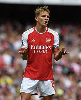 Images Dated 26th August 2023: Arsenal's Martin Odegaard Shines in Premier League Clash Against Fulham (2023-24)