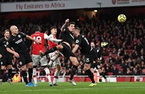 Images Dated 6th December 2019: Arsenal's Martinelli Battles Past Brighton's Dunk in Premier League Clash