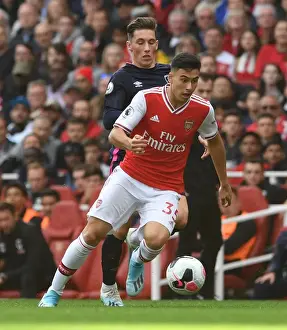 Arsenal V AFC Bournemouth 2019-20 Prints: Arsenal's Martinelli Clashes with Bournemouth's Wilson in Premier League Showdown