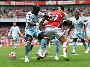 Arsenal's Martinelli Clashes with Forest's Aurier and Danilo in 2023-24 Premier League Showdown
