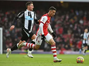 Arsenal V Newcastle United 2021-22 Prints: Arsenal's Martinelli Clashes with Newcastle's Schar in Premier League Showdown