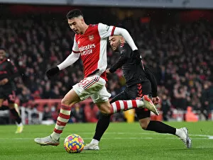 Images Dated 11th December 2021: Arsenal's Martinelli Clashes with Southampton's Redmond in Premier League Showdown