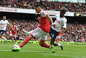 Arsenal's Martinelli Clashes with Tottenham's Emerson Royal in 2022-23 Premier League Showdown