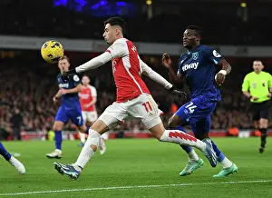 Arsenal V West Ham United 2023-24 Prints: Arsenal's Martinelli Clashes with West Ham's Kudus in 2023-24 Premier League Showdown