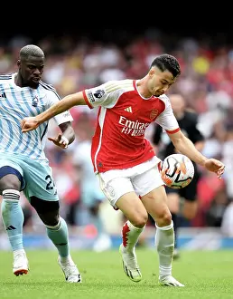 Arsenal's Martinelli Faces Off Against Forest's Aurier in 2023-24 Premier League Clash