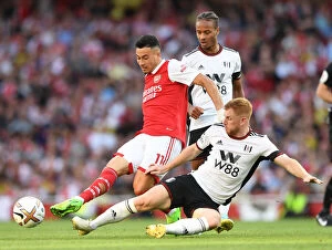 Arsenal v Fulham 2022-23 Collection: Arsenal's Martinelli Faces Off Against Fulham's Reed in Premier League Clash