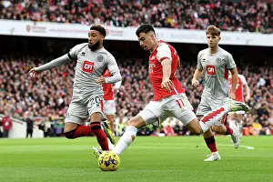 Arsenal's Martinelli Faces Off Against Sheffield United's Bogle: A Premier League Showdown (2023-24)