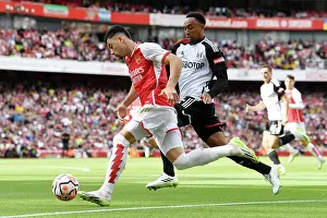 Arsenal's Martinelli Fends Off Fulham's Tete in Premier League Clash (2023-24)