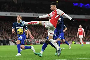 Arsenal V West Ham United 2023-24 Prints: Arsenal's Martinelli Fends Off West Ham Pressure in Premier League Clash (2023-24)