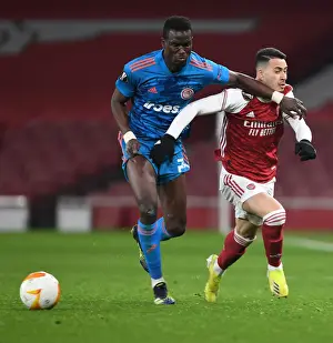 Arsenal's Martinelli Fouls Ba in Empty Europa League Clash: Arsenal vs. Olympiacos