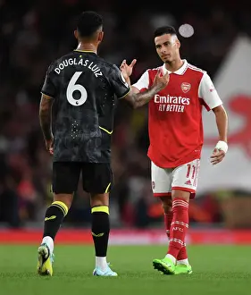 Arsenal's Martinelli and Luiz Share a Moment After Arsenal v Aston Villa Premier League Clash (2022-23)