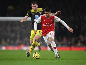 Arsenal's Martinelli Outmaneuvers Southampton's Hojbjerg in Premier League Clash