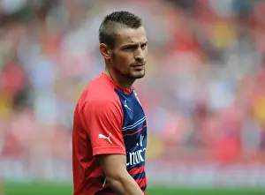 Arsenal V Benfica 2014-15 Prints: Arsenal's Mathieu Debuchy Prepares for Arsenal v Benfica at Emirates Stadium (2014-15)