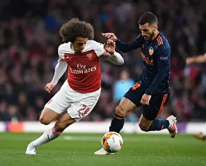 Arsenal's Matteo Guendouzi Battles Past Valencia's Jose Gaya in Europa League Semi-Final Showdown