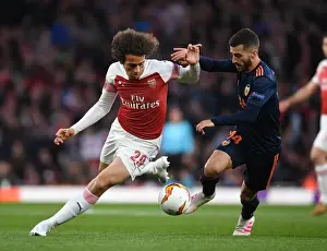 Arsenal's Matteo Guendouzi Outmaneuvers Valencia's Jose Gaya in UEFA Europa League Semi-Final Clash