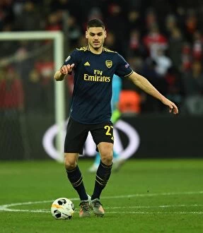 Images Dated 13th December 2019: Arsenal's Mavropanos in Action against Standard Liege in UEFA Europa League (December 2019)