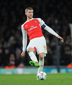 Arsenal V Barcelona 2015/16 Prints: Arsenal's Per Mertesacker in Action Against FC Barcelona, UEFA Champions League 2016