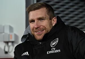 Images Dated 13th December 2019: Arsenal's Mertesacker Coaches in UEFA Europa League Match against Standard Liege