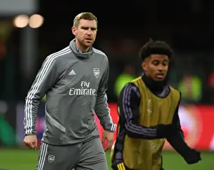 Arsenal's Mertesacker Coaches in UEFA Europa League Match against Standard Liege
