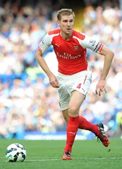 Arsenal's Per Mertesacker Faces Off Against Chelsea at Stamford Bridge, 2014-15 Premier League
