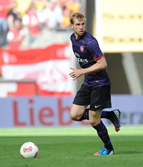Cologne V Arsenal 2012-13 Prints: Arsenal's Per Mertesacker Goes Head-to-Head with FC Cologne in 2012 Pre-Season Clash
