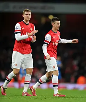 Arsenal's Mertesacker and Koscielny Celebrate Victory Over Hull City